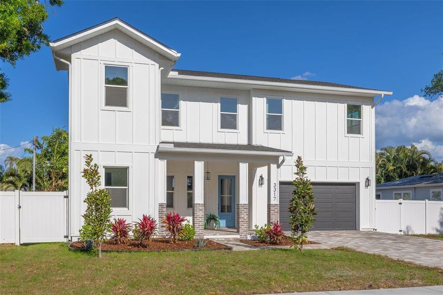 Front exterior of a new home in , St. Petersburg, FL, highlighting curb appeal (Image 27).