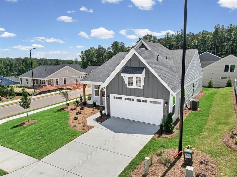 Front exterior of a new home in Easton Park, Dallas, GA, highlighting curb appeal (Image 2). Front exterior of a new home in Easton Park, Dallas, GA, highlighting curb appeal (Image 2).