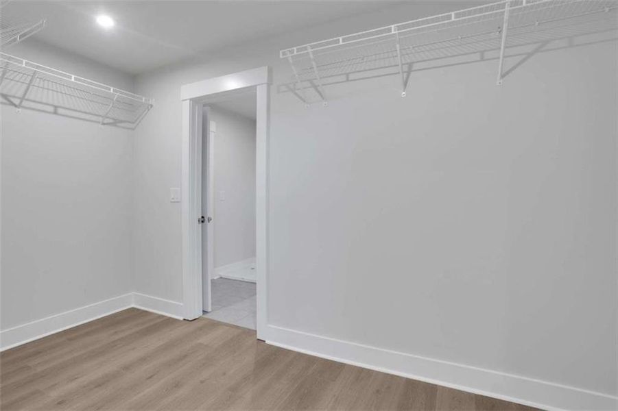 Spacious, unfurnished interior of a new home in The Paddocks at Doc Hughes, Buford (Image 28).