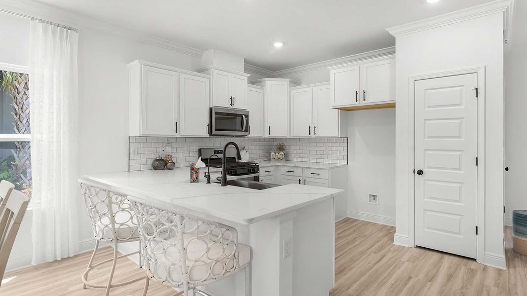 Furnished interior view inside a new home in Colonial East, Panama City Beach (Image 8).