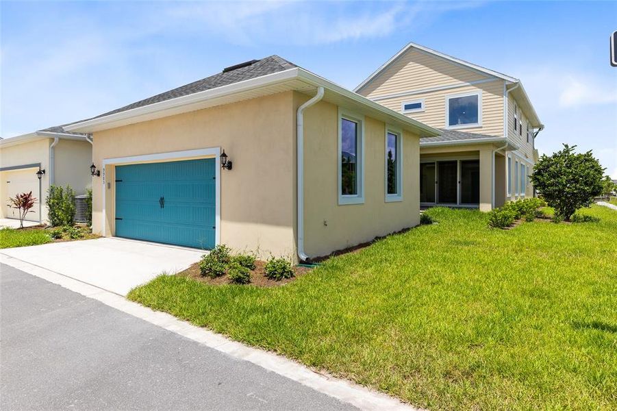 Front exterior of a new home in , Orlando, FL, highlighting curb appeal (Image 29).