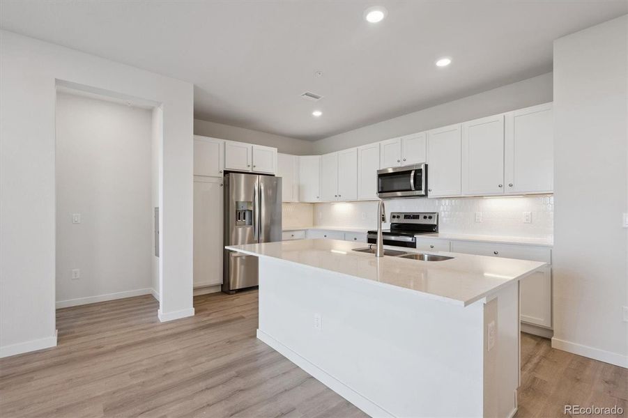 Furnished interior view inside a new home in Condo Collection at Grand Vue at Interlocken, Broomfield (Image 5). Furnished interior view inside a new home in Condo Collection at Grand Vue at Interlocken, Broomfield (Image 5).