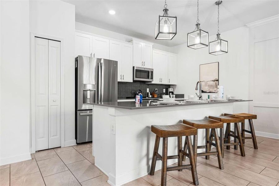 Furnished interior view inside a new home in , Kissimmee (Image 13). Furnished interior view inside a new home in , Kissimmee (Image 13).