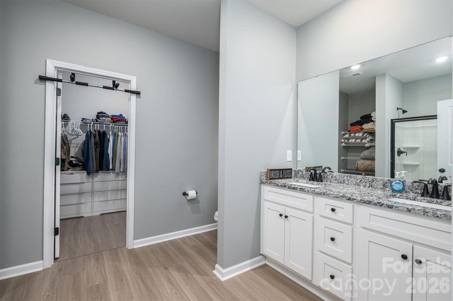 Primary Bath with view of closet