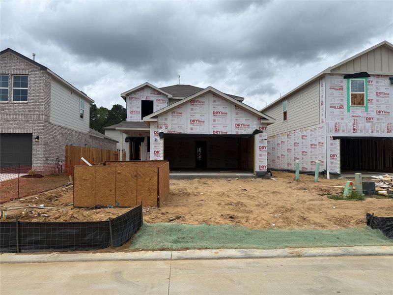 In-progress construction of a new home in The Lakes at Black Oak Villas, Magnolia, TX (Image 19).