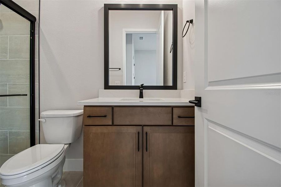 Furnished interior view inside a new home in Emerald Landing at Waterside at Lakewood Ranch – Lake Series, Sarasota (Image 13).