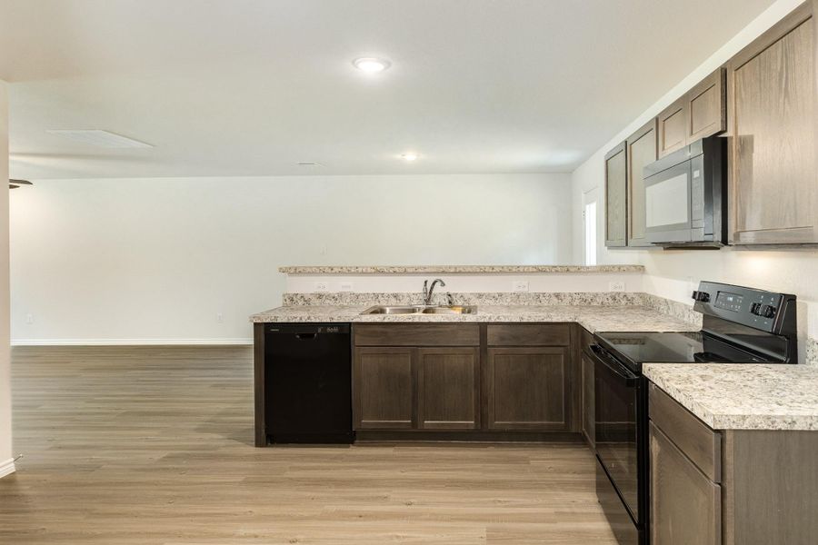 Furnished interior view inside a new home in , Sweeny (Image 7). Furnished interior view inside a new home in , Sweeny (Image 7).