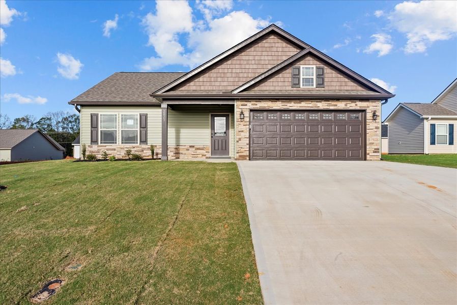 Representative exterior photo of a completed home built from the Rozlynn by Enchanted Homes in New Prospect Haven, Inman, SC (Image 1).
