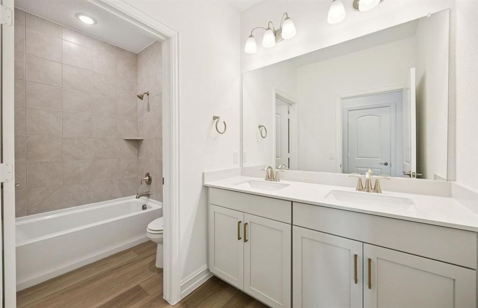 Spacious secondary bathroom with double vanity