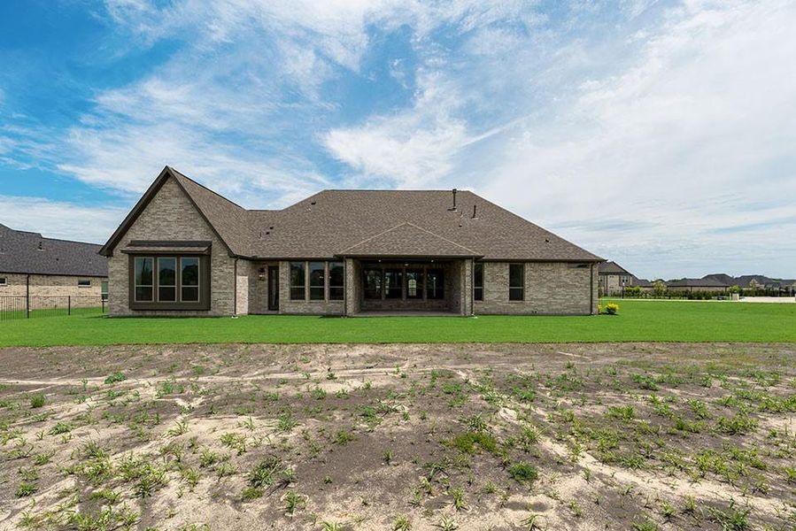 Exterior details and patio area of a home in King's Crossing - Phase 3, Parker (Image 3).