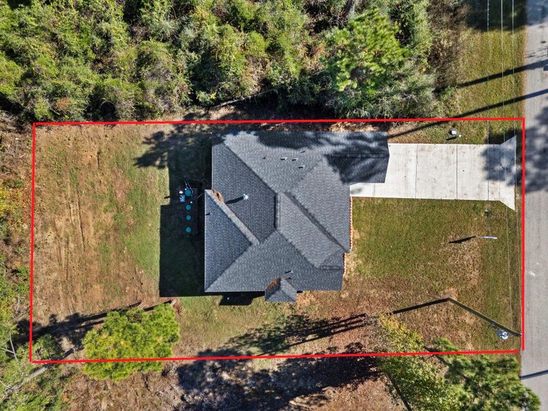 This aerial view showcases the large 8,750 sqft Lot.