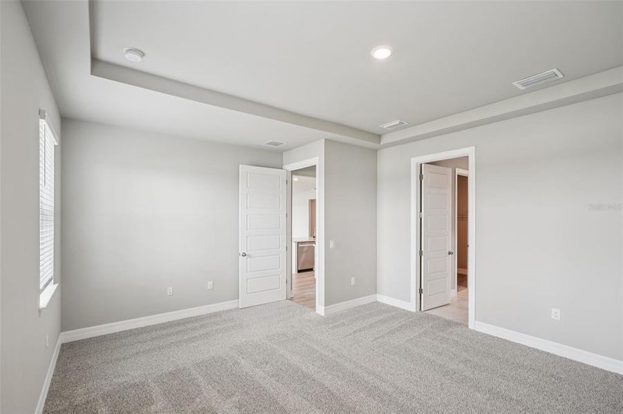Spacious, unfurnished interior of a new home in Crescent Lakes - Signature Series, Punta Gorda (Image 32).
