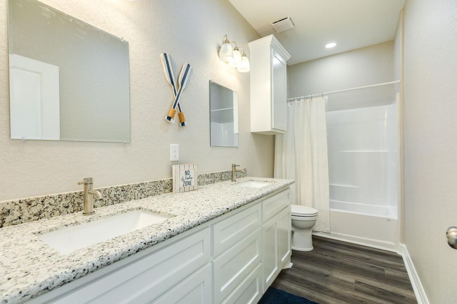 Double sink in bathroom with tub Double sink in bathroom with tub