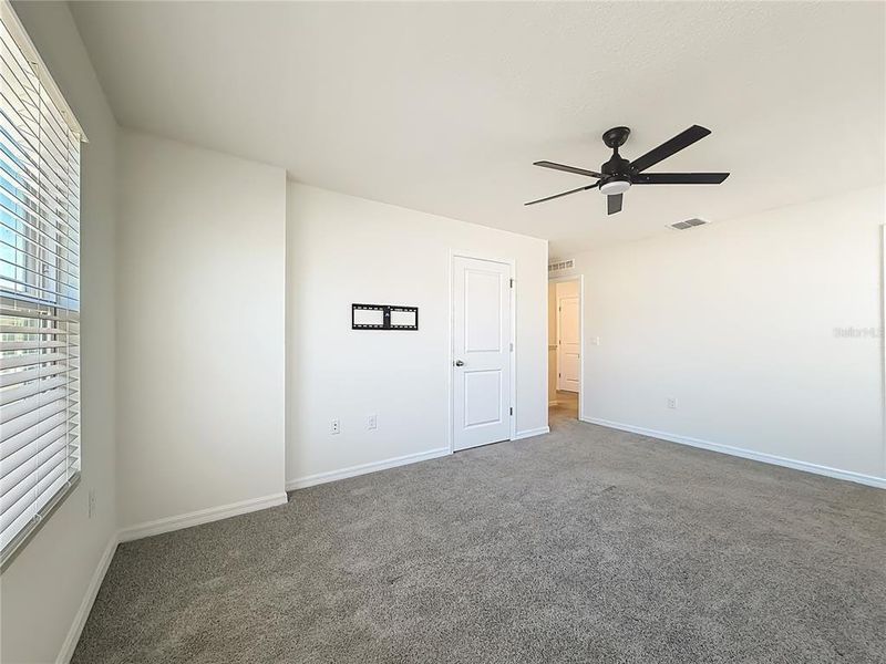 Spacious, unfurnished interior of a new home in The Towns at Laurel Commons, Ocala (Image 32).