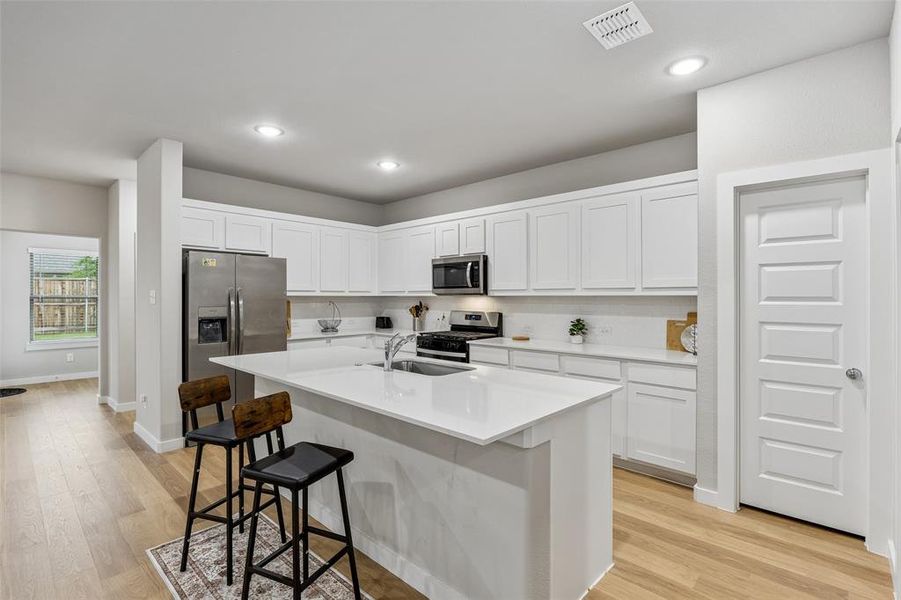 Furnished interior view inside a new home in LakePointe, Lavon (Image 10).