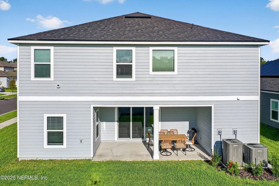 Front exterior of a new home in , Middleburg, FL, highlighting curb appeal (Image 27).