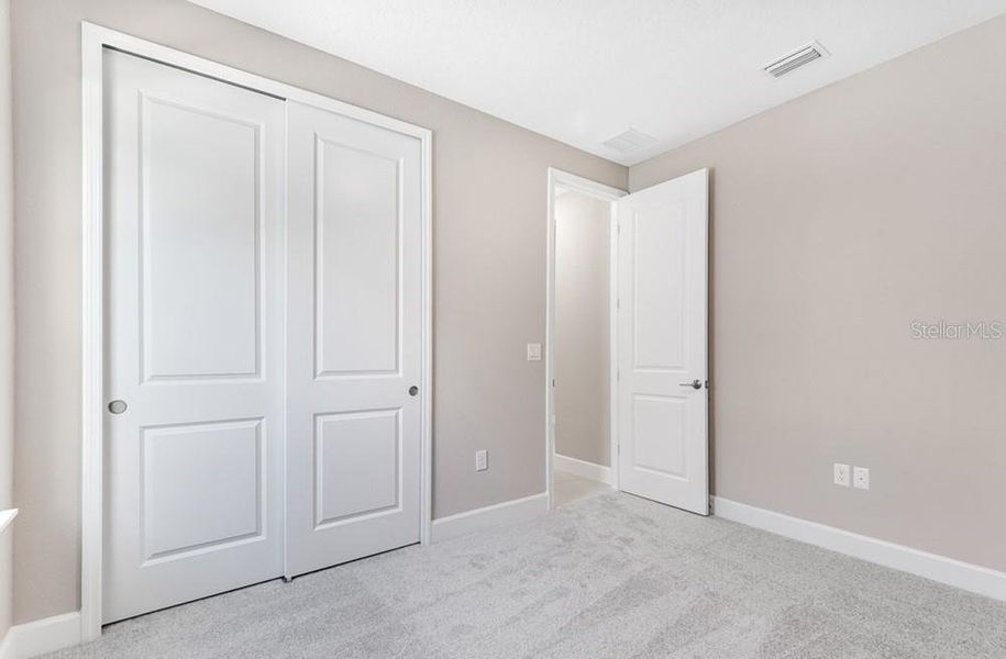 Spacious, unfurnished interior of a new home in Colbert Landings, Palm Coast (Image 19).