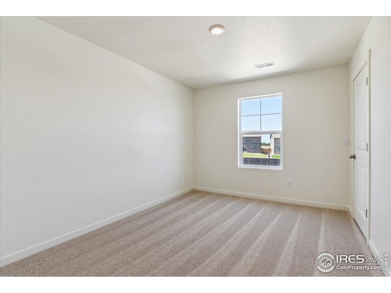 Spacious, unfurnished interior of a new home in Silver Peaks, Lochbuie (Image 21).