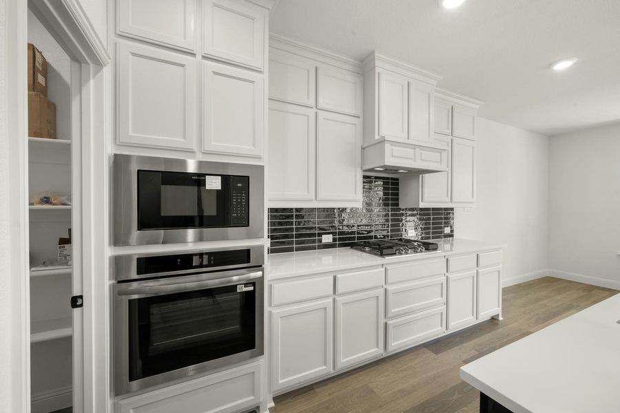 Furnished interior view inside a new home in Kentsdale Farms, DeSoto (Image 12).