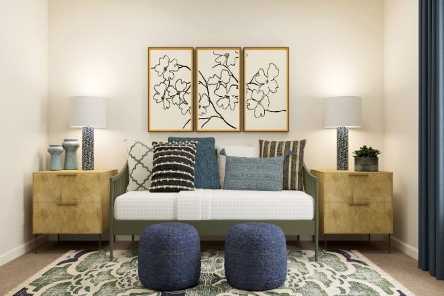 A couch with blue and white pillows. A couch with blue and white pillows.