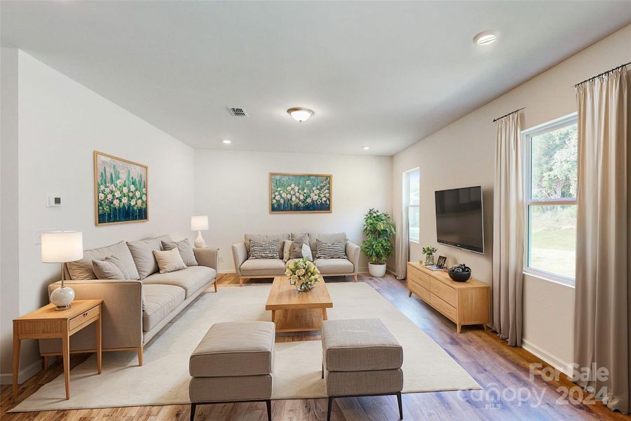 Family room shown with virtual staging