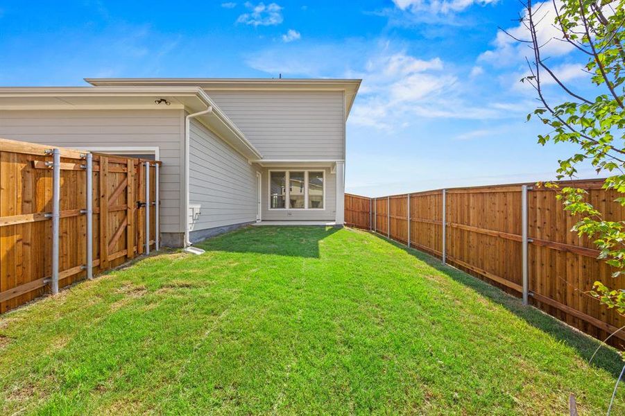 Exterior details and patio area of a home in The Heights at Uptown Celina, Celina (Image 2). Exterior details and patio area of a home in The Heights at Uptown Celina, Celina (Image 2).