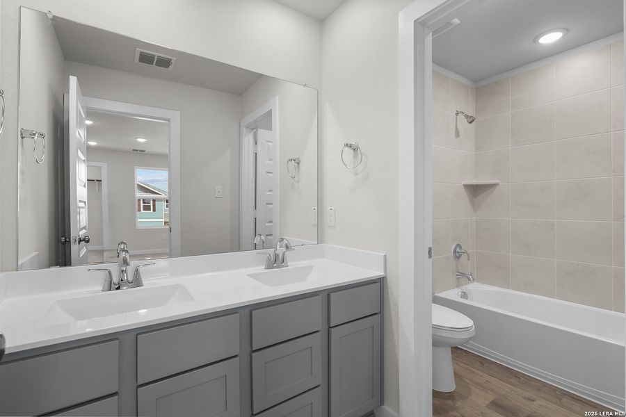 Furnished interior view inside a new home in Hacienda, San Antonio (Image 15).