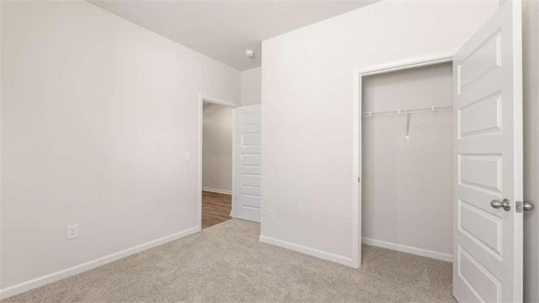 Spacious, unfurnished interior of a new home in The Reserve at Calcutta, Stockbridge (Image 28). Spacious, unfurnished interior of a new home in The Reserve at Calcutta, Stockbridge (Image 28).