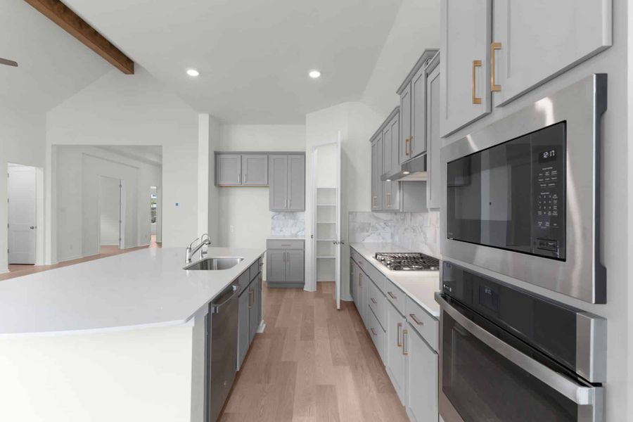 Furnished interior view inside a new home in Parkside on the River, Georgetown (Image 30).