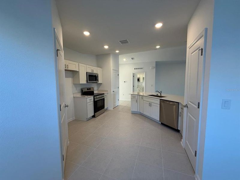 Furnished interior view inside a new home in , Kissimmee (Image 14).