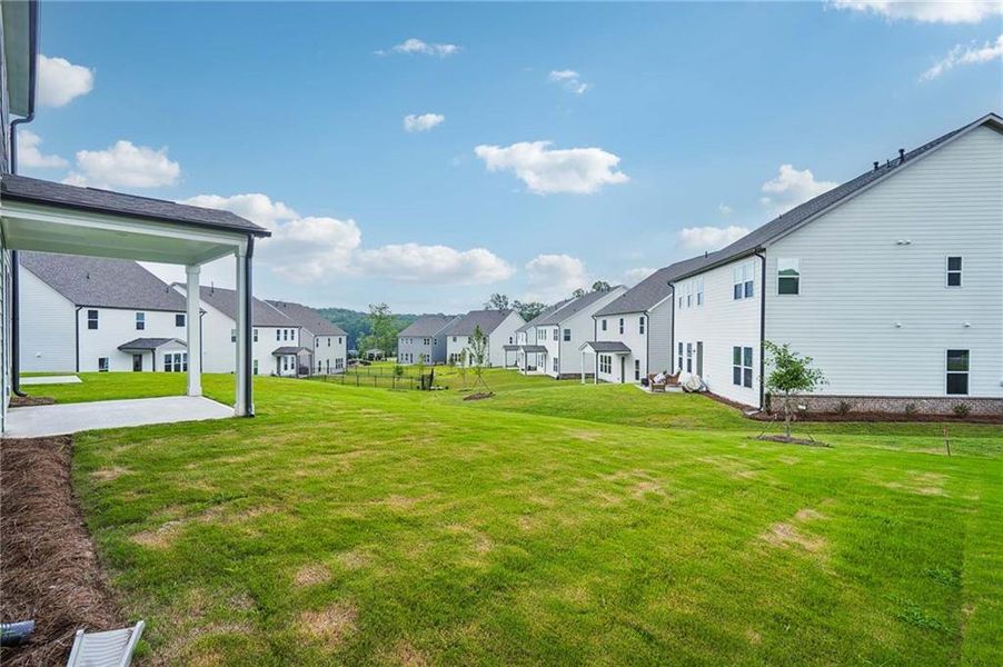 Exterior details and patio area of a home in East Harbor II at Chestatee, Dawsonville (Image 3).