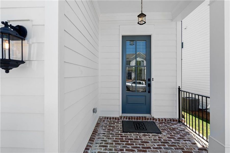 Exterior details and patio area of a home in Palisades Single Family, Cumming (Image 26).