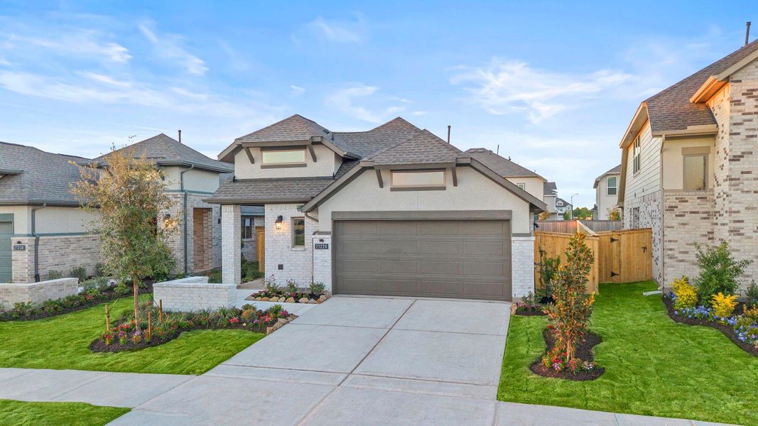 Front exterior of a new home in Bridgeland, Cypress, TX, highlighting curb appeal (Image 17).
