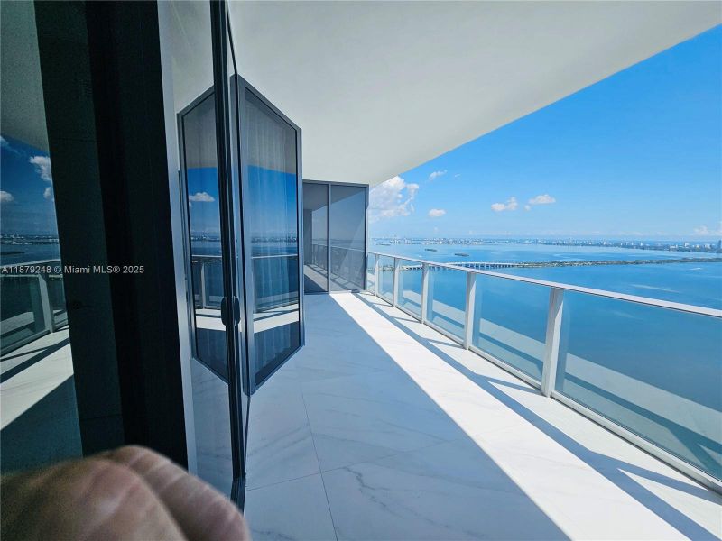 Exterior details and patio area of a home in , Miami (Image 25).