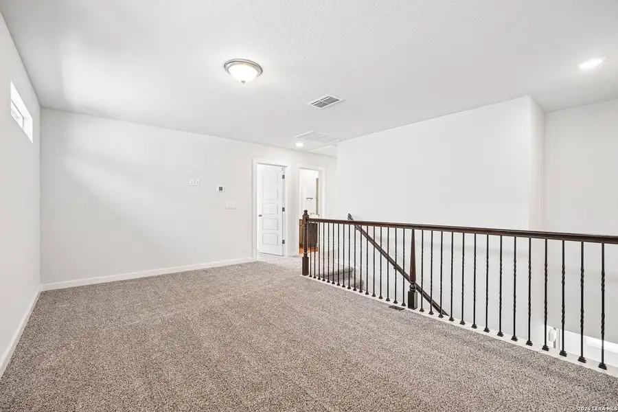 Spacious, unfurnished interior of a new home in Weston Oaks, San Antonio (Image 31).