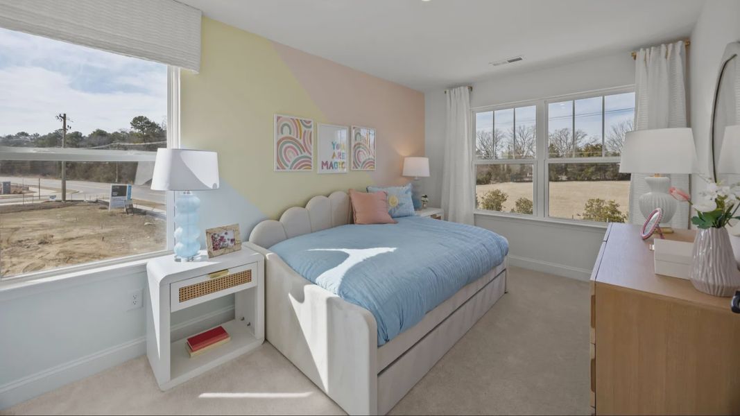The Rochester Plan by DRB homes spacious secondary bedroom in Charlotte, NC.