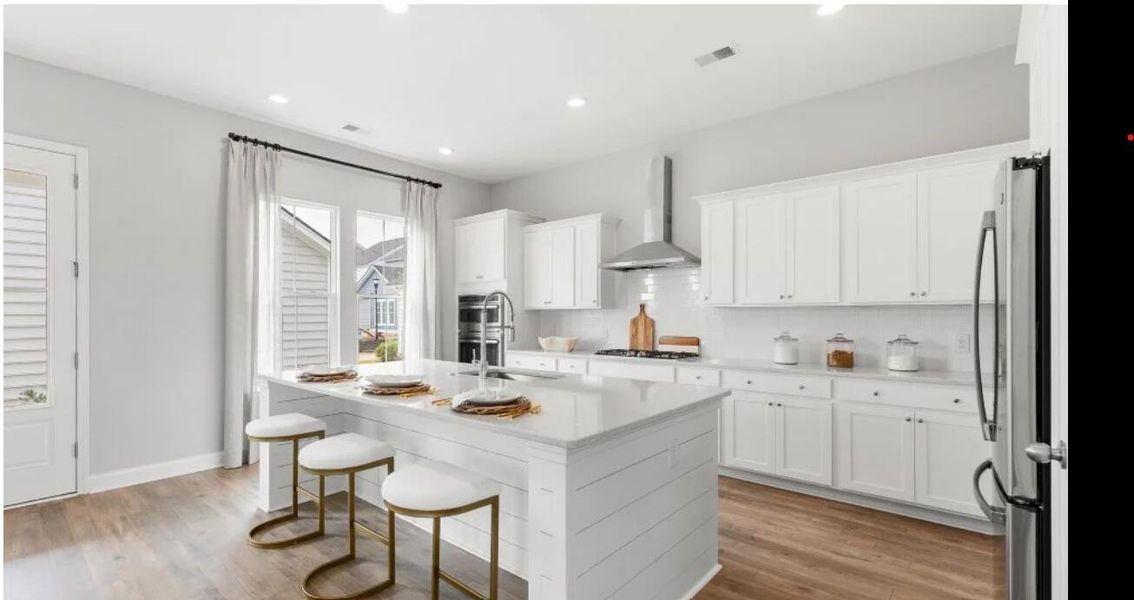 Furnished interior view inside a new home in Heron's Walk at Summers Corner: Row - Elevated Collection, Summerville (Image 5).