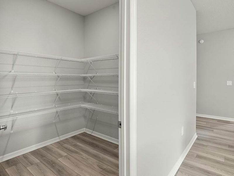 Enjoy the storage convenience of a walk-in pantry.
