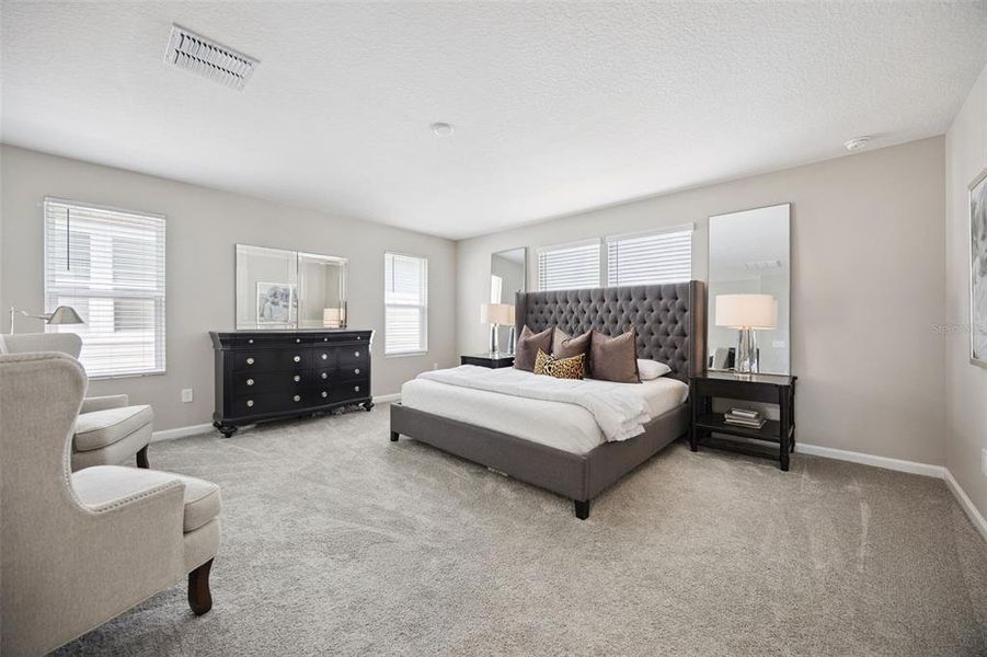 Furnished interior view inside a new home in Seasons at The Grove, Mascotte (Image 18).