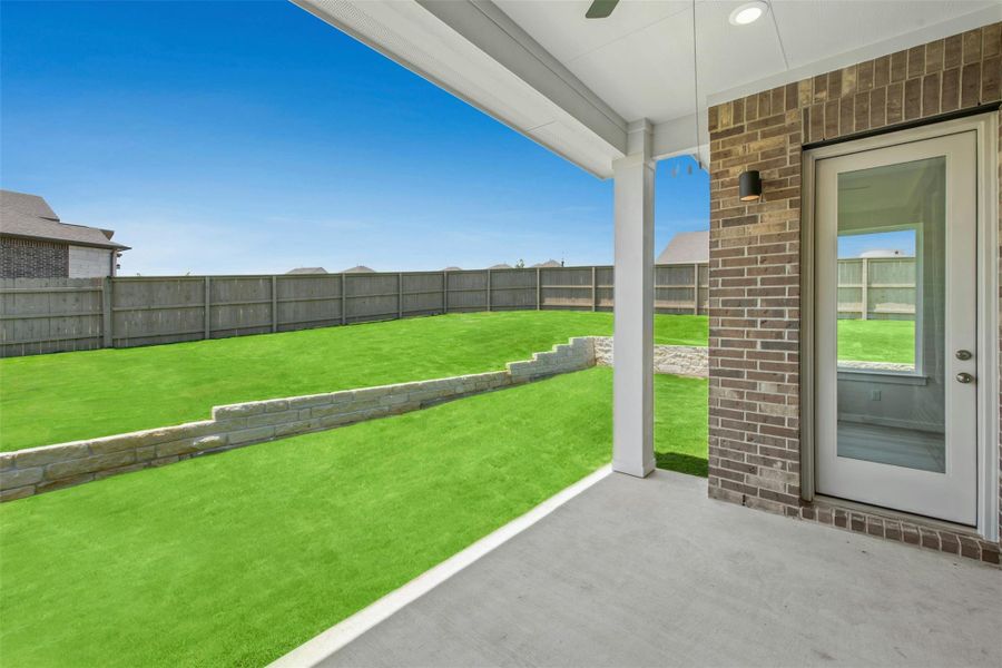 Front exterior of a new home in The Colony, Bastrop, TX, highlighting curb appeal (Image 17). Front exterior of a new home in The Colony, Bastrop, TX, highlighting curb appeal (Image 17).