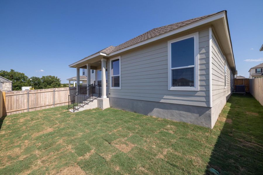 Front exterior of a new home in Sonterra - Cool Water, Jarrell, TX, highlighting curb appeal (Image 14).