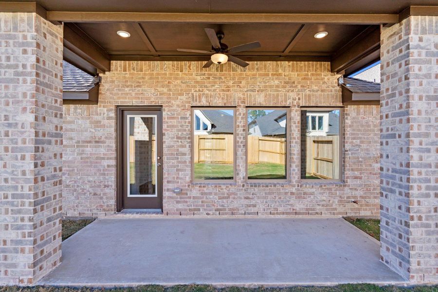 Exterior details and patio area of a home in The Highlands, Porter (Image 3).