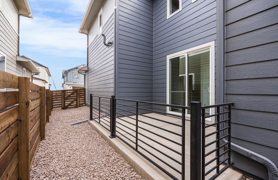Exterior details and patio area of a home in Barefoot Village, Firestone (Image 28). Exterior details and patio area of a home in Barefoot Village, Firestone (Image 28).