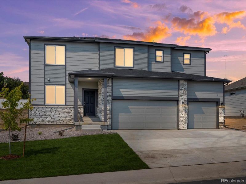 Front exterior of a new home in Poudre Heights: The Alpine Collection, Windsor, CO, highlighting curb appeal (Image 20).