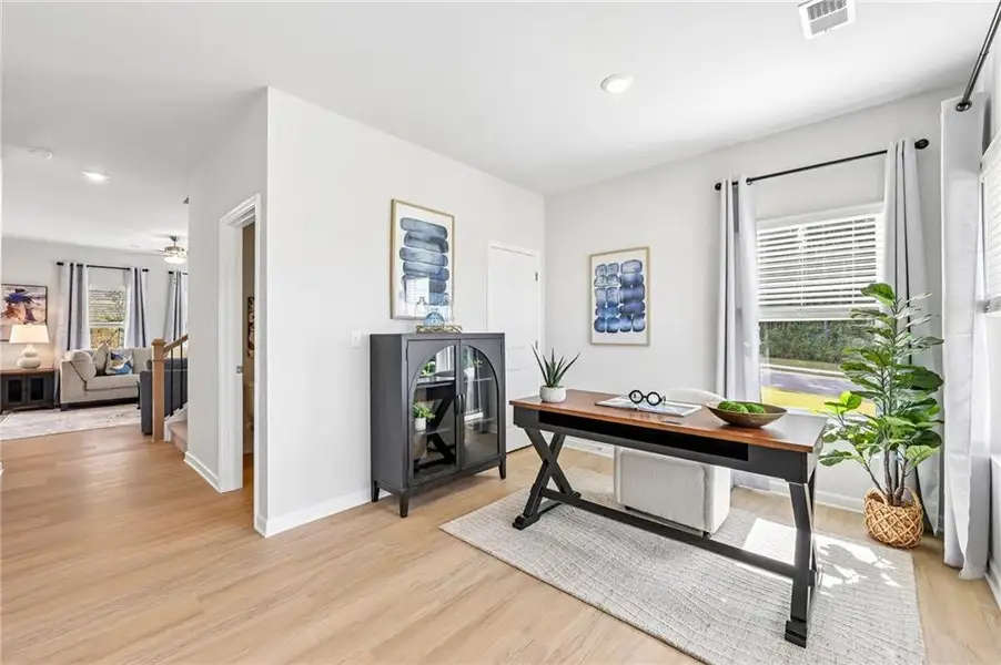 Furnished interior view inside a new home in The Hills at Cedar Creek, Winder (Image 12).
