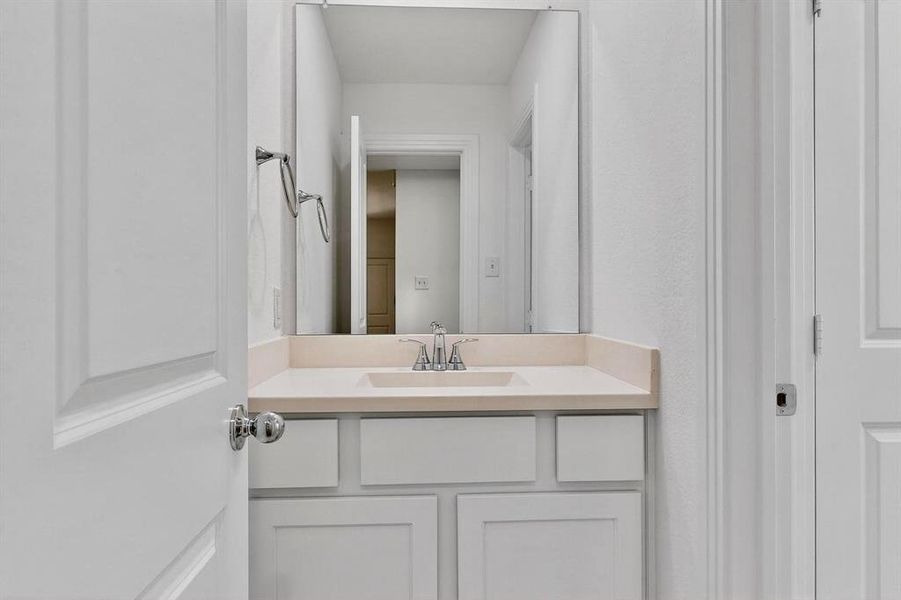 Bathroom featuring vanity Bathroom featuring vanity