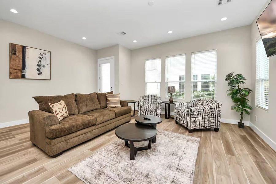Natural light fills the open living area, giving you plenty of room to relax, host friends, or simply settle in after a long day.