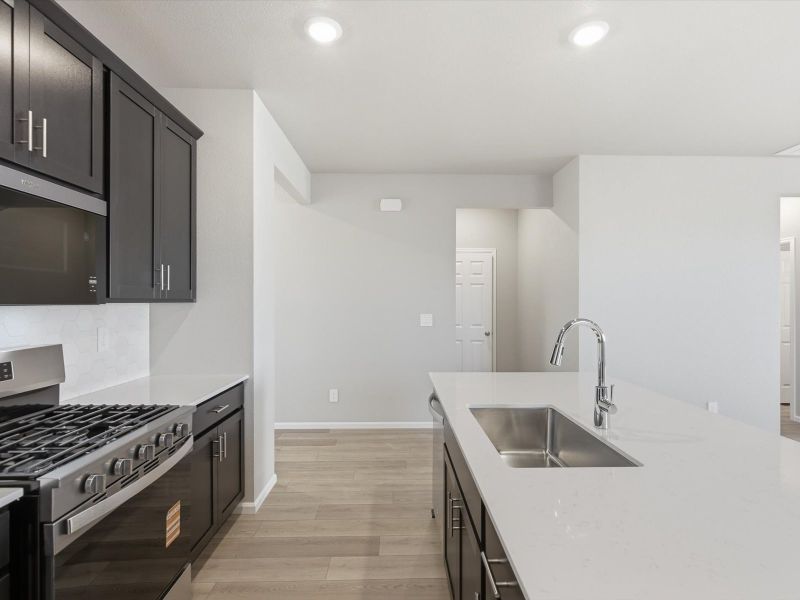 Furnished interior view inside a new home in Buffalo Highlands: The Canyon Collection, Commerce City (Image 9).