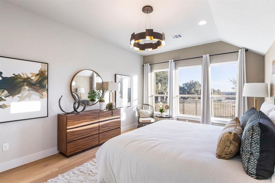 Step through the french doors into the spa-like bath.