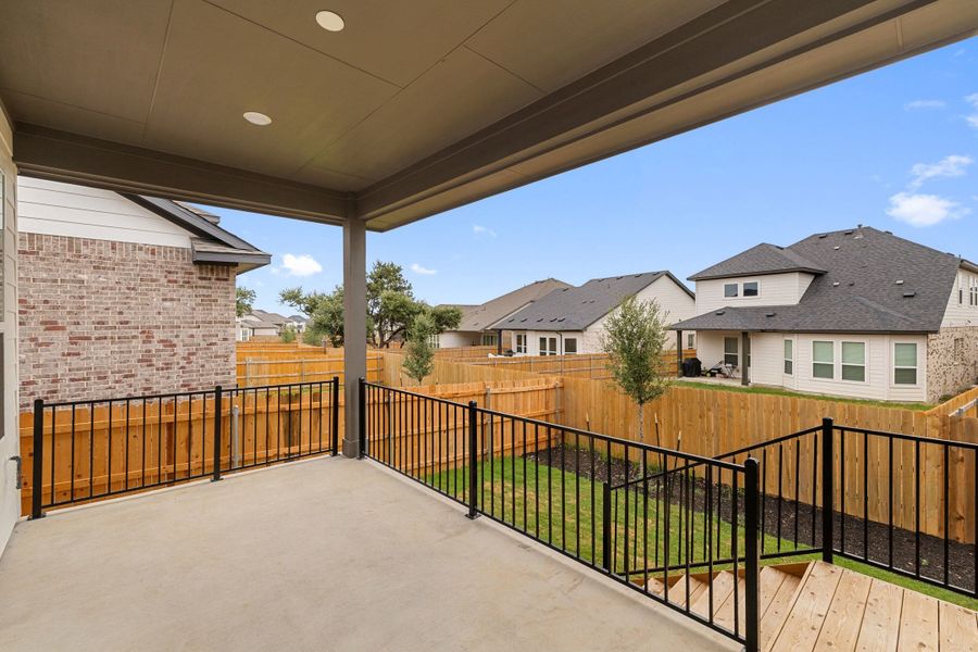 Exterior details and patio area of a home in Heritage, Dripping Springs (Image 29).